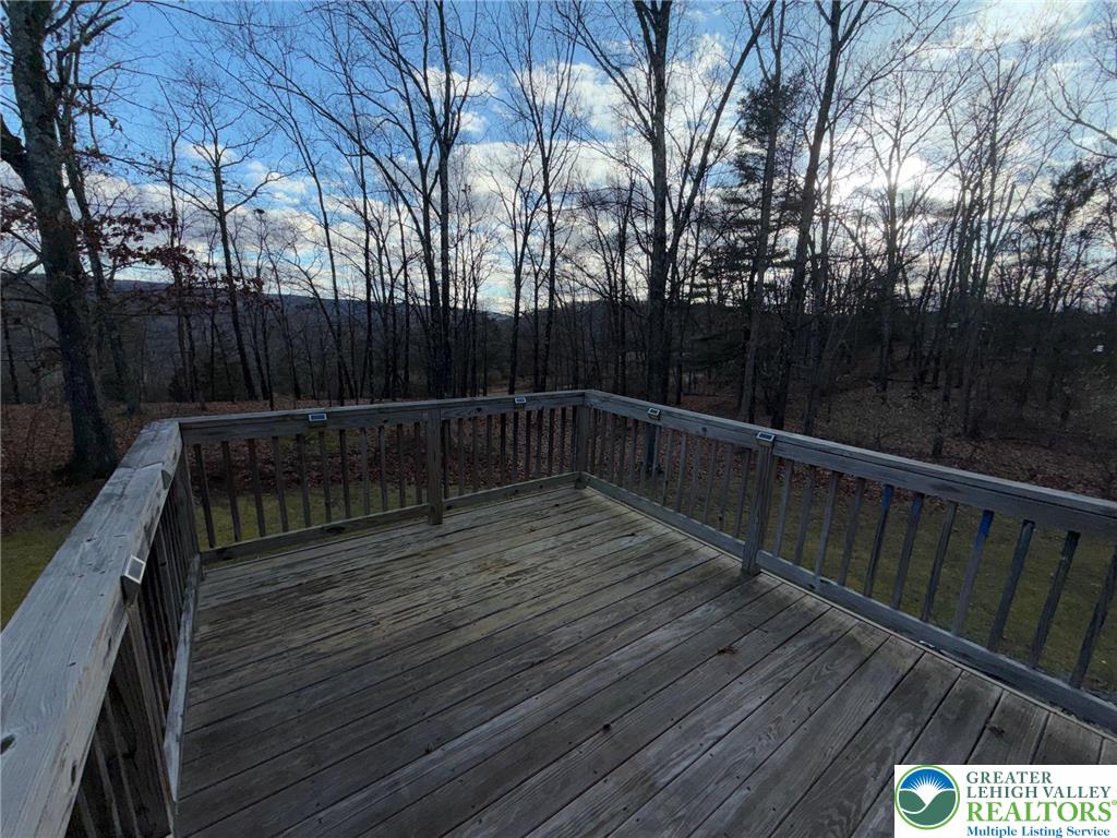 106 Hilda Court East Stroudsburg, PA 18301 - Photo 31 of 33 a view of deck with wooden floor and outdoor seating