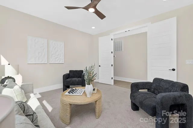 a living room with furniture and a couch