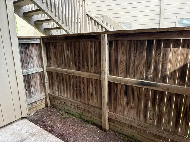 a view of wooden fence