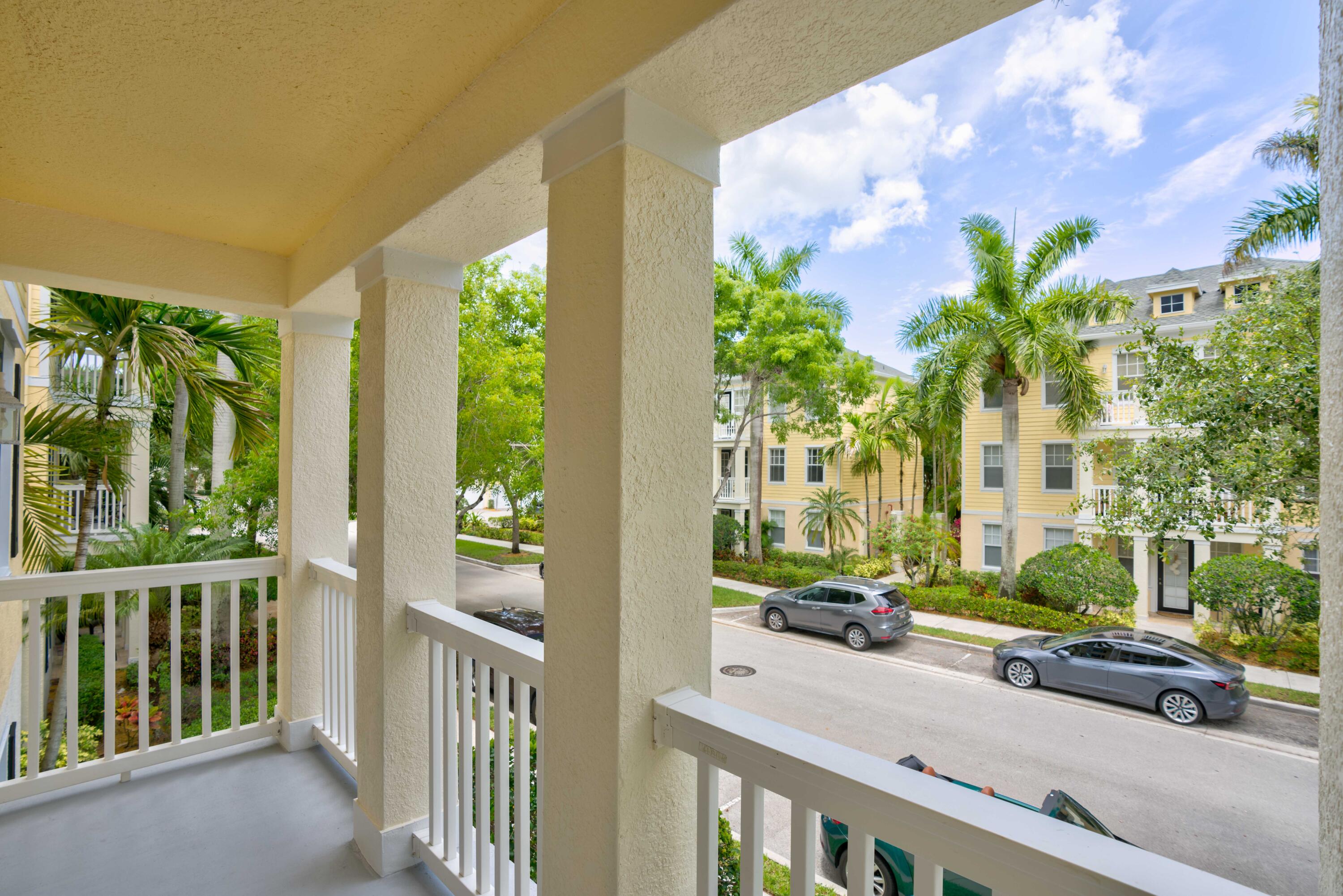 224 Murcia Drive, Unit 201 Jupiter, FL 33458 - Photo 2 of 36 a house view with a garden space