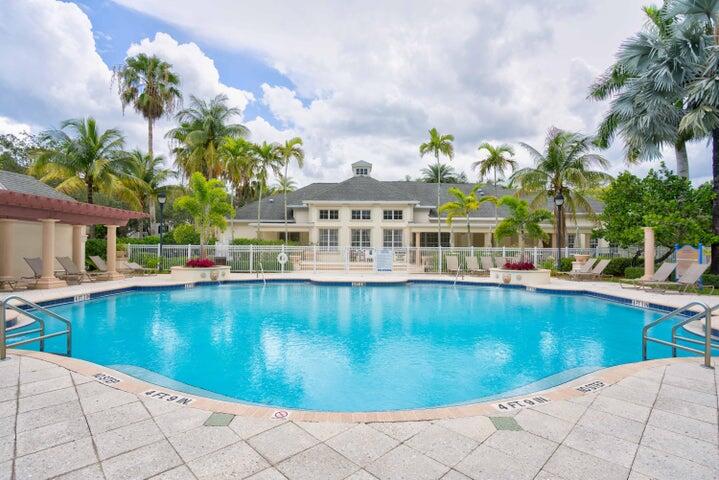 224 Murcia Drive, Unit 201 Jupiter, FL 33458 - Photo 29 of 36 a view of a swimming pool with a patio