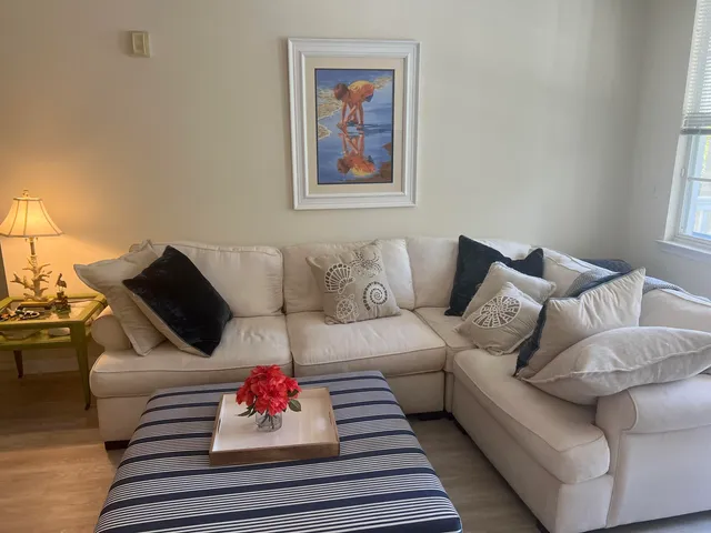 a living room with furniture and a couch