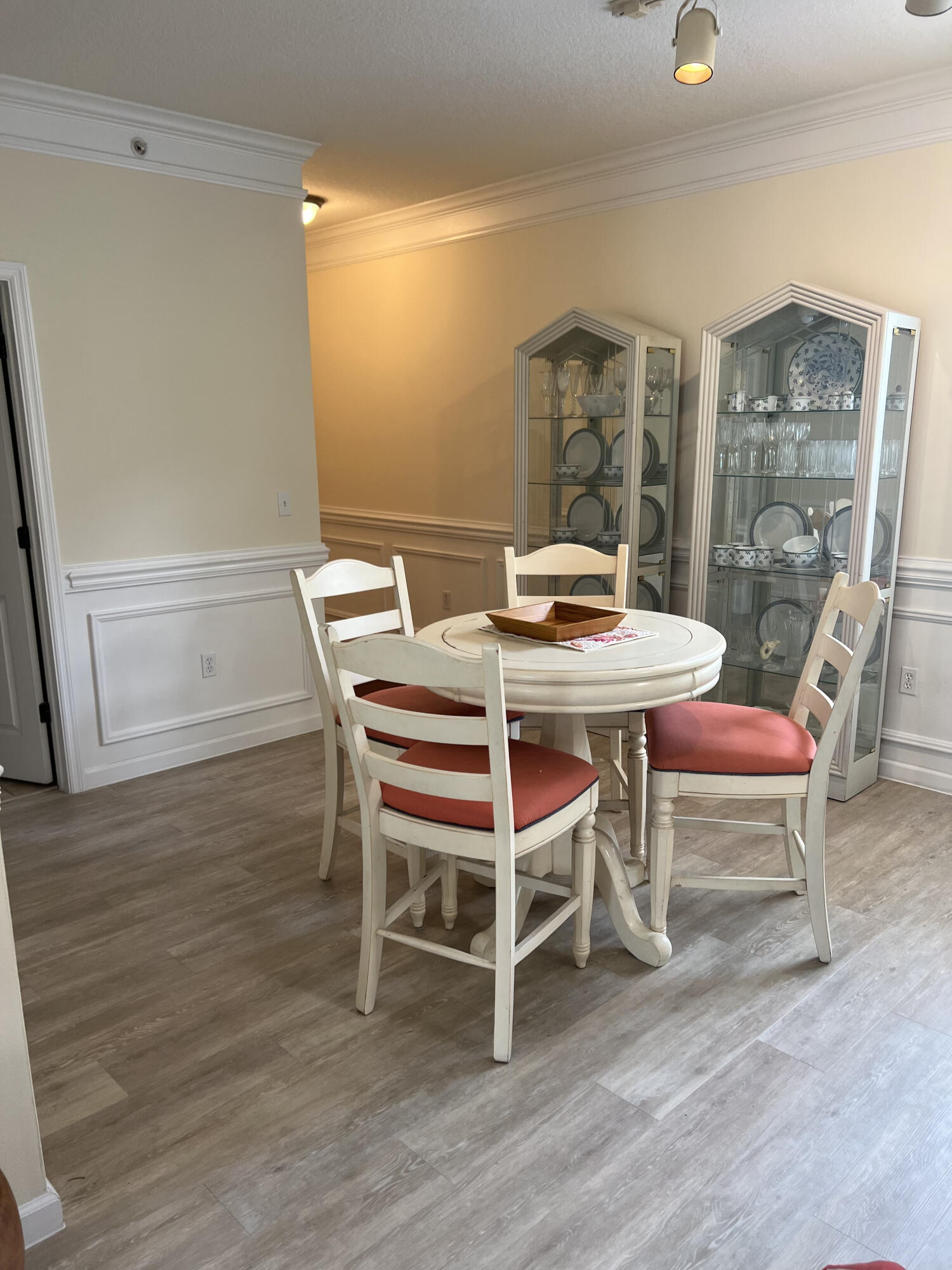 224 Murcia Drive, Unit 201 Jupiter, FL 33458 - Photo 6 of 36 a view of a dining room with furniture window and wooden floor