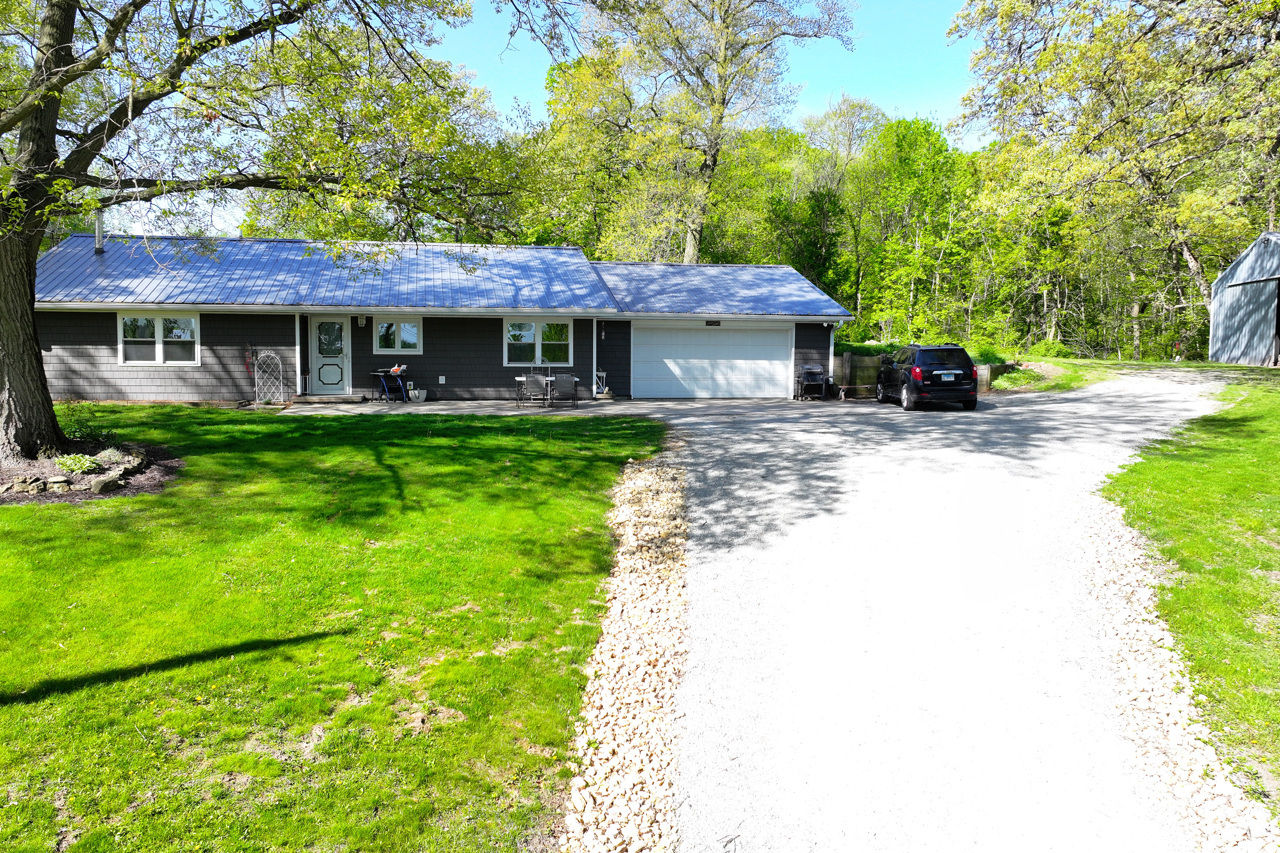 14755 Fenton Road Morrison, IL 61270 - Photo 25 of 34 a view of a house with garden