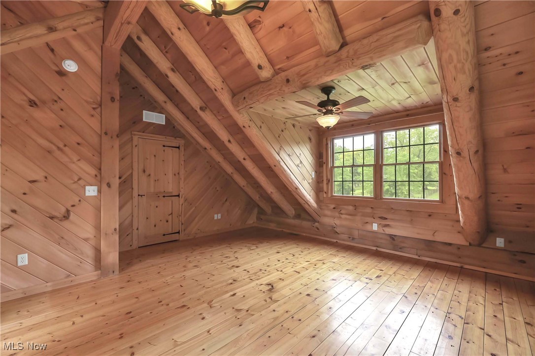 8164 Vandemark Road Lodi, OH 44254 - Photo 28 of 50 View of wood floors and front windows in primary bedroom