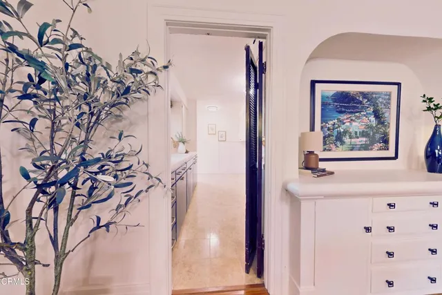 a bathroom with a bathtub sink and mirror
