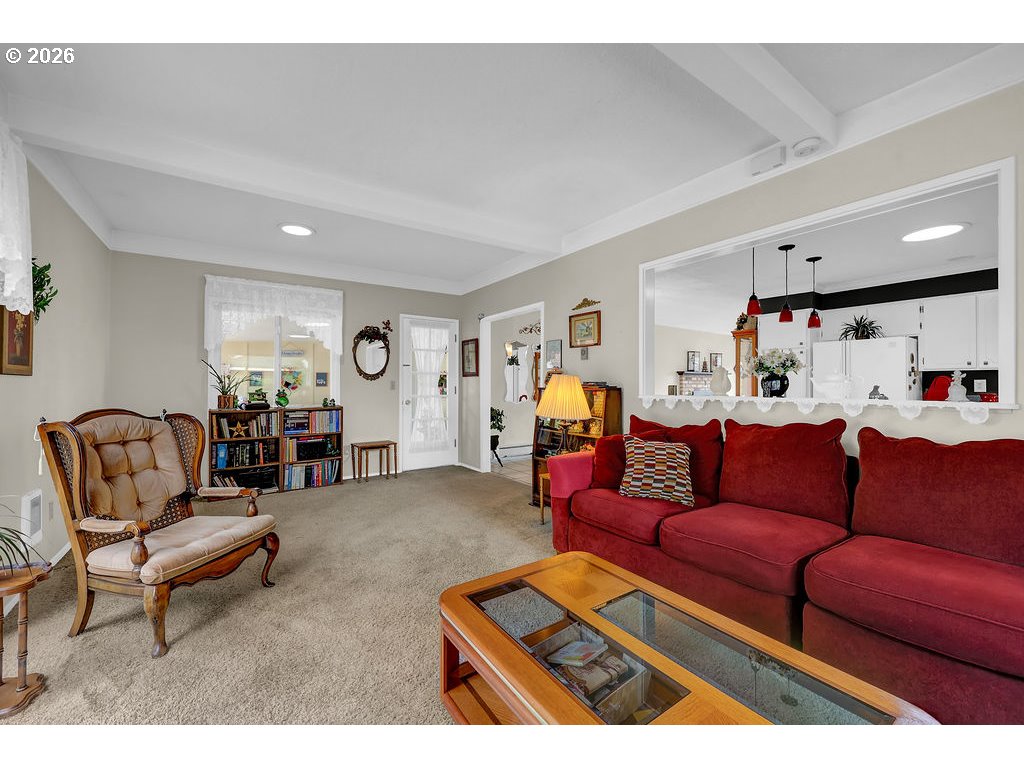 1415 20th Street Florence, OR 97439 - Photo 22 of 40 a living room with furniture and a couch
