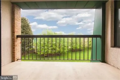 a view of a balcony with an outdoor space