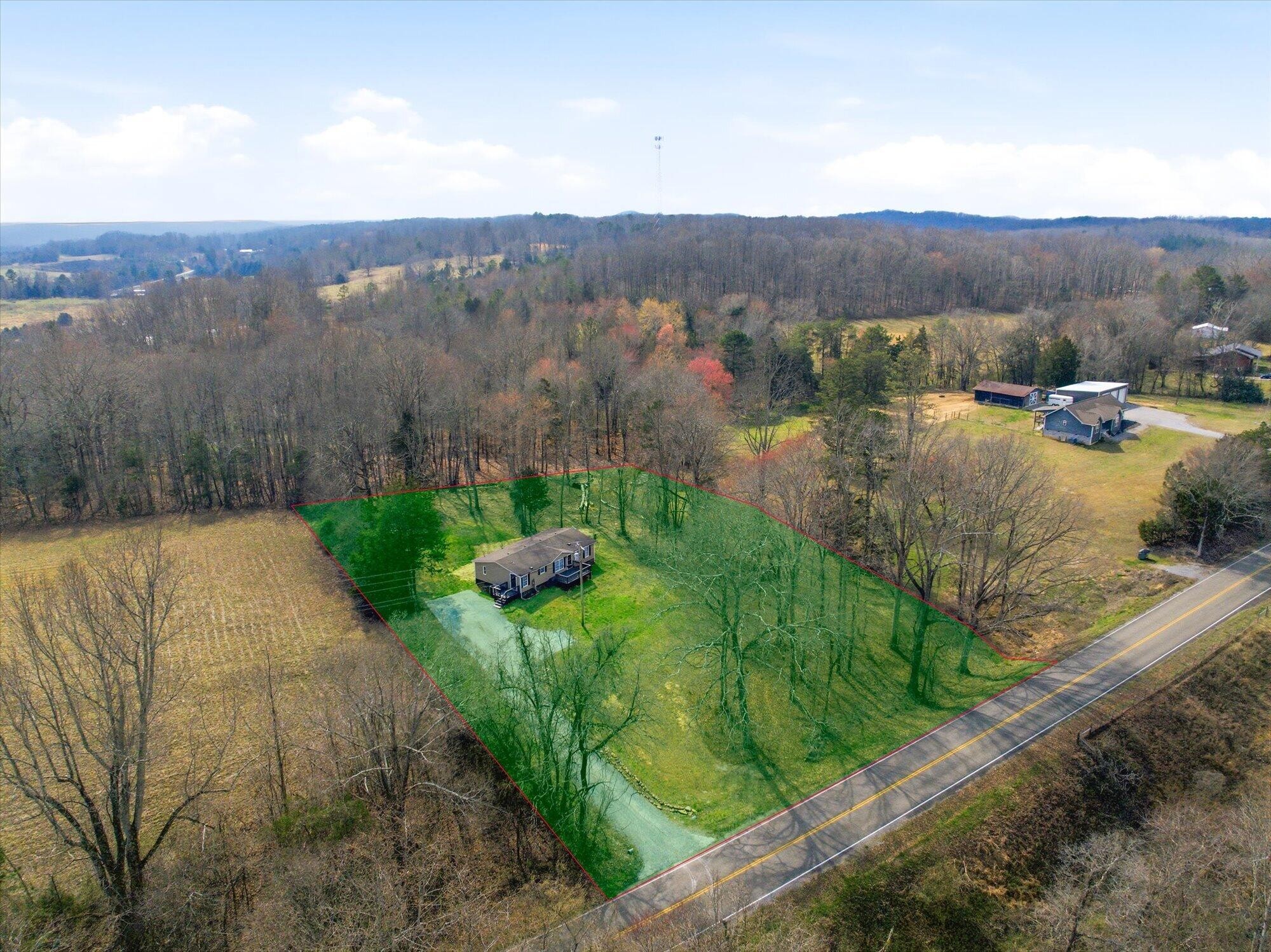 64 County Road 100 Decatur, TN 37322 - Photo 25 of 43 a view of a backyard with green space