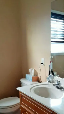 a bathroom with a sink and a toilet