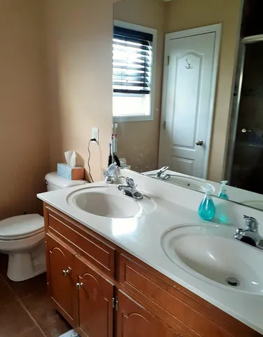 a bathroom with a sink and a toilet