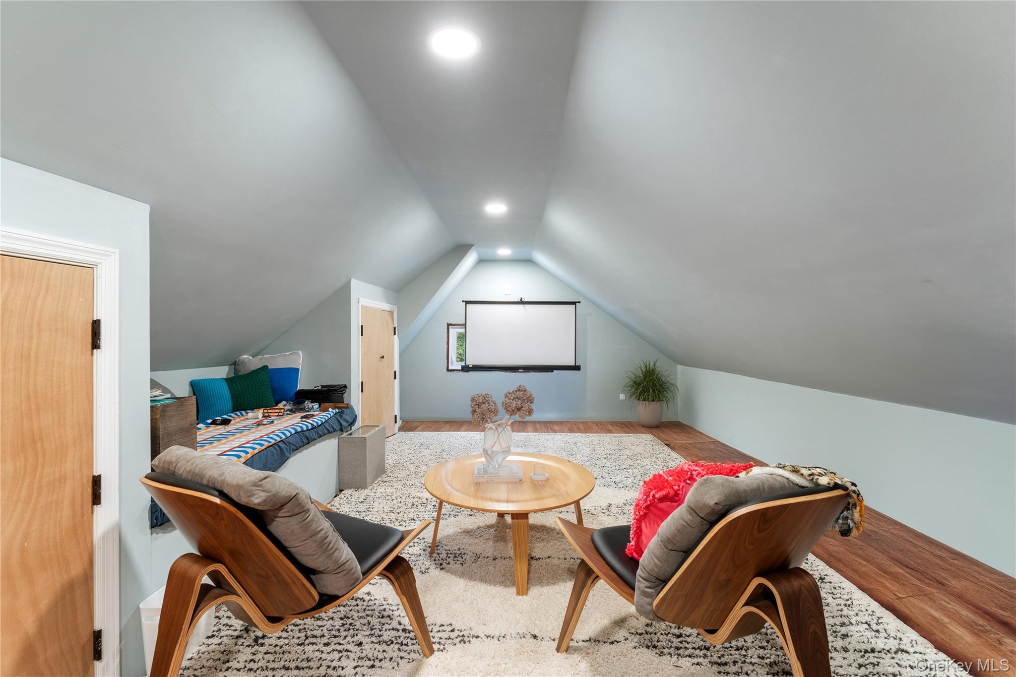 989 Rte 9W Nyack, NY 10960 - Photo 34 of 50 Partially finished attic, perfect for movie nights or legos. Plus lots of additional storage space.