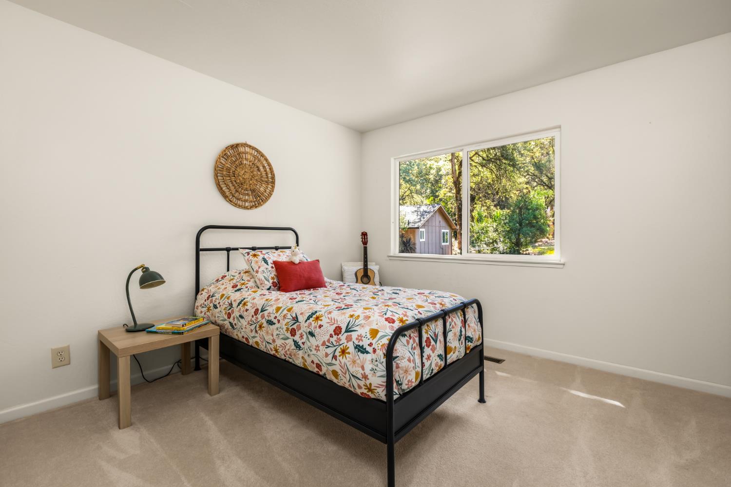 10875 Spenceville Road Penn Valley, CA 95946 - Photo 19 of 49 a bedroom with a bed and a window