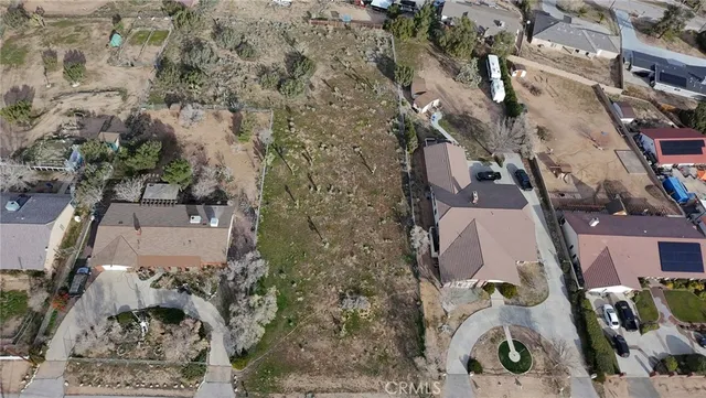 an aerial view of residential house with outdoor space