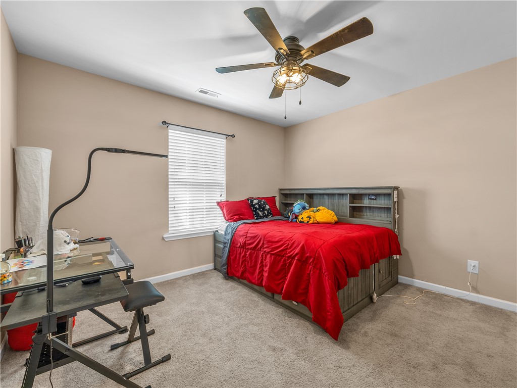 2520 Linmar Circle Anderson, SC 29621 - Photo 31 of 50 A comfortable bedroom with a vaulted ceiling and window blinds provides a private sanctuary.