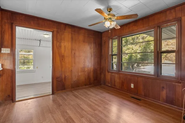 a kitchen with sink cabinets and window
