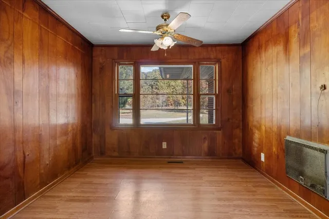 a kitchen with a stove a sink and a refrigerator
