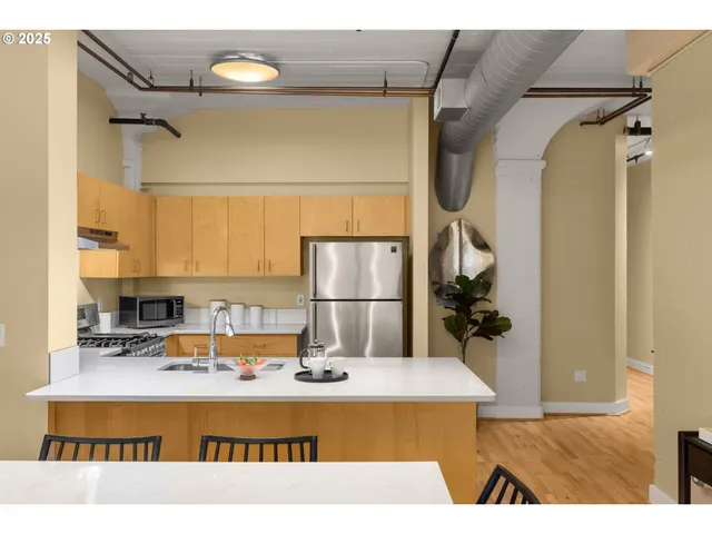 a room with a table and chairs