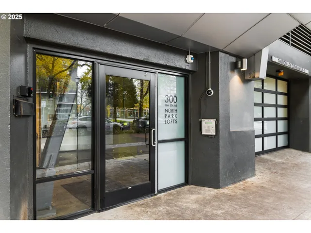 a view of a glass door and the balcony