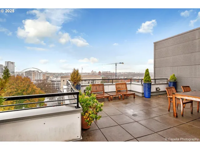 a view of a terrace with furniture