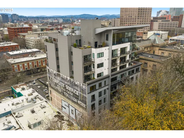 a view of a city with tall buildings