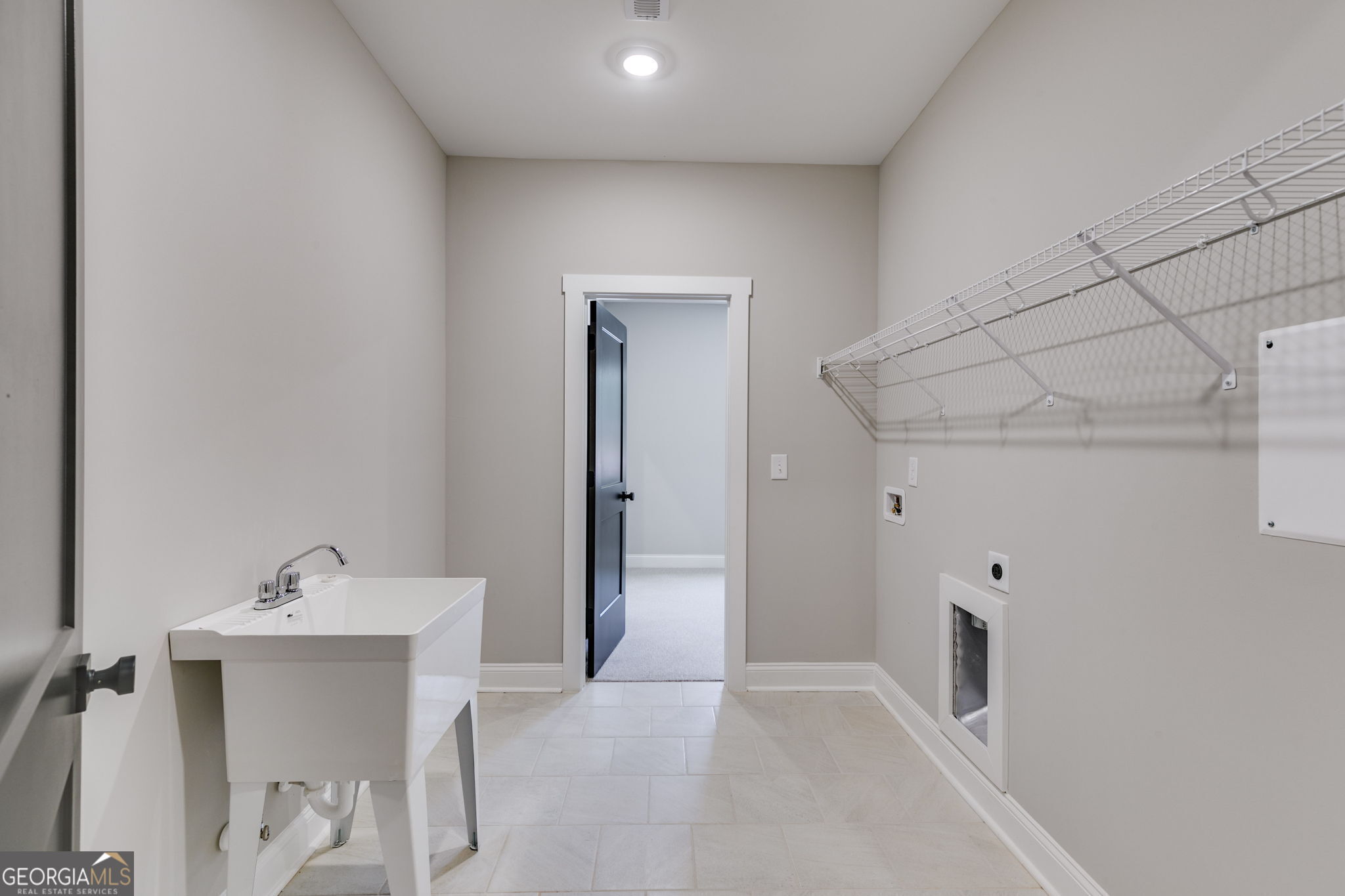 1575 Bethesda Church Road Carrollton, GA 30117 - Photo 28 of 46 a bathroom with a sink and mirror