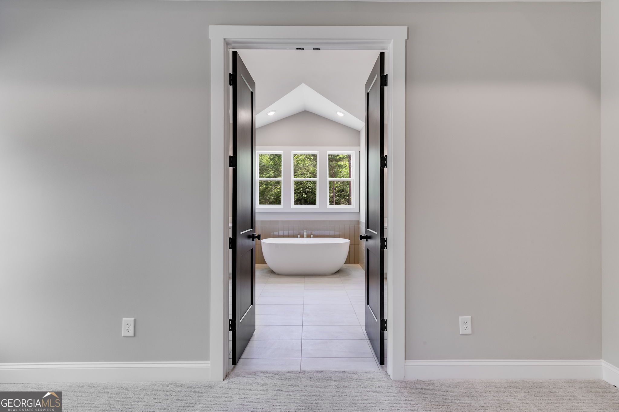 1575 Bethesda Church Road Carrollton, GA 30117 - Photo 31 of 46 a view of front door and bedroom