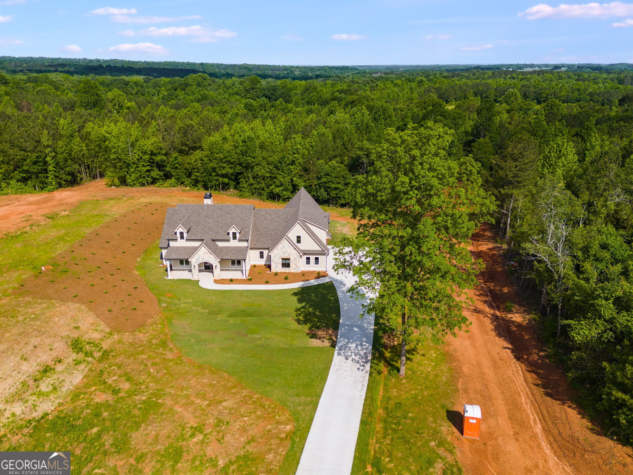 1575 Bethesda Church Road Carrollton, GA 30117 - Photo 4 of 46 a view of a lake with a building in the background