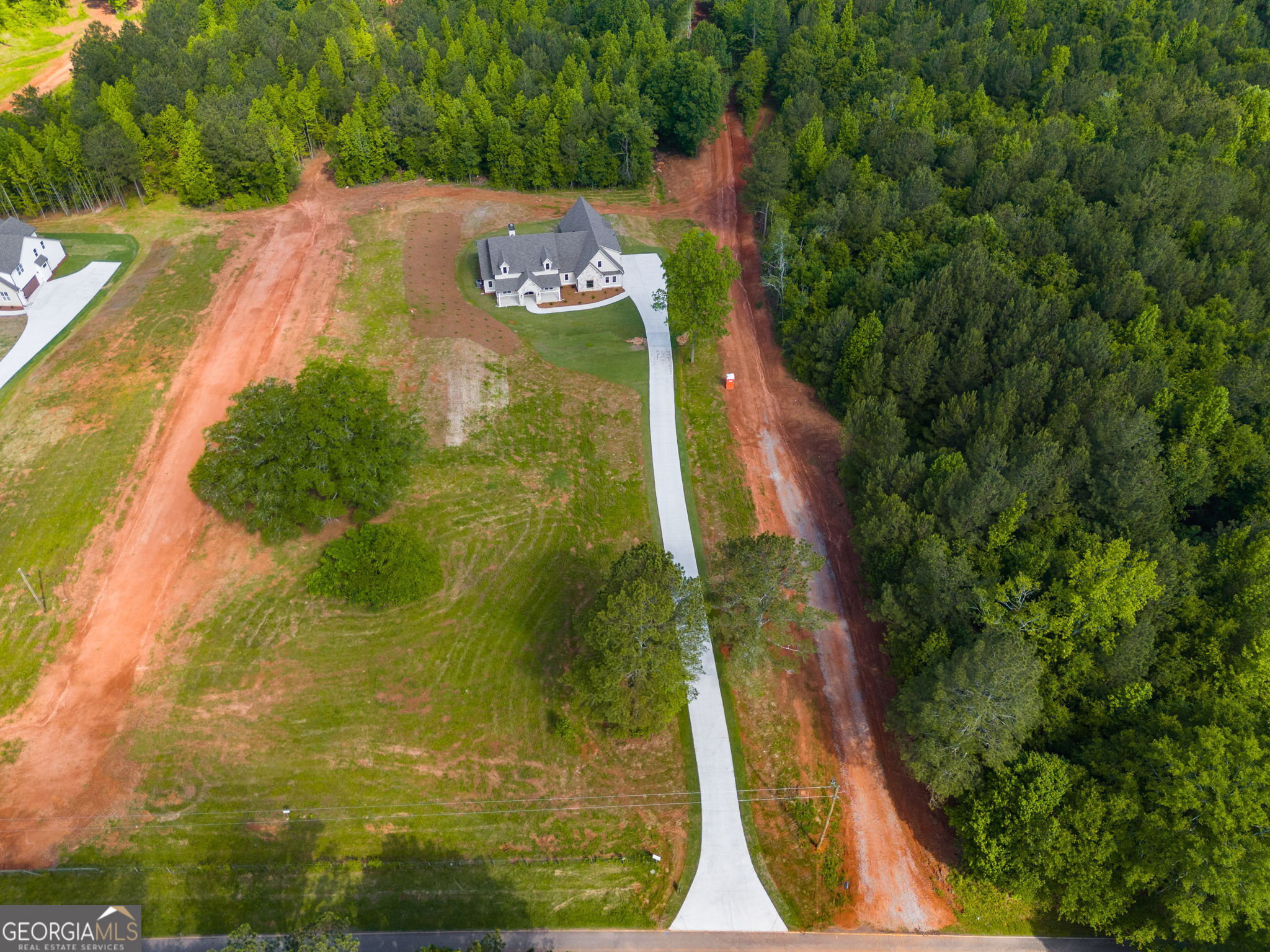 1575 Bethesda Church Road Carrollton, GA 30117 - Photo 42 of 46 a view of a back yard from a balcony