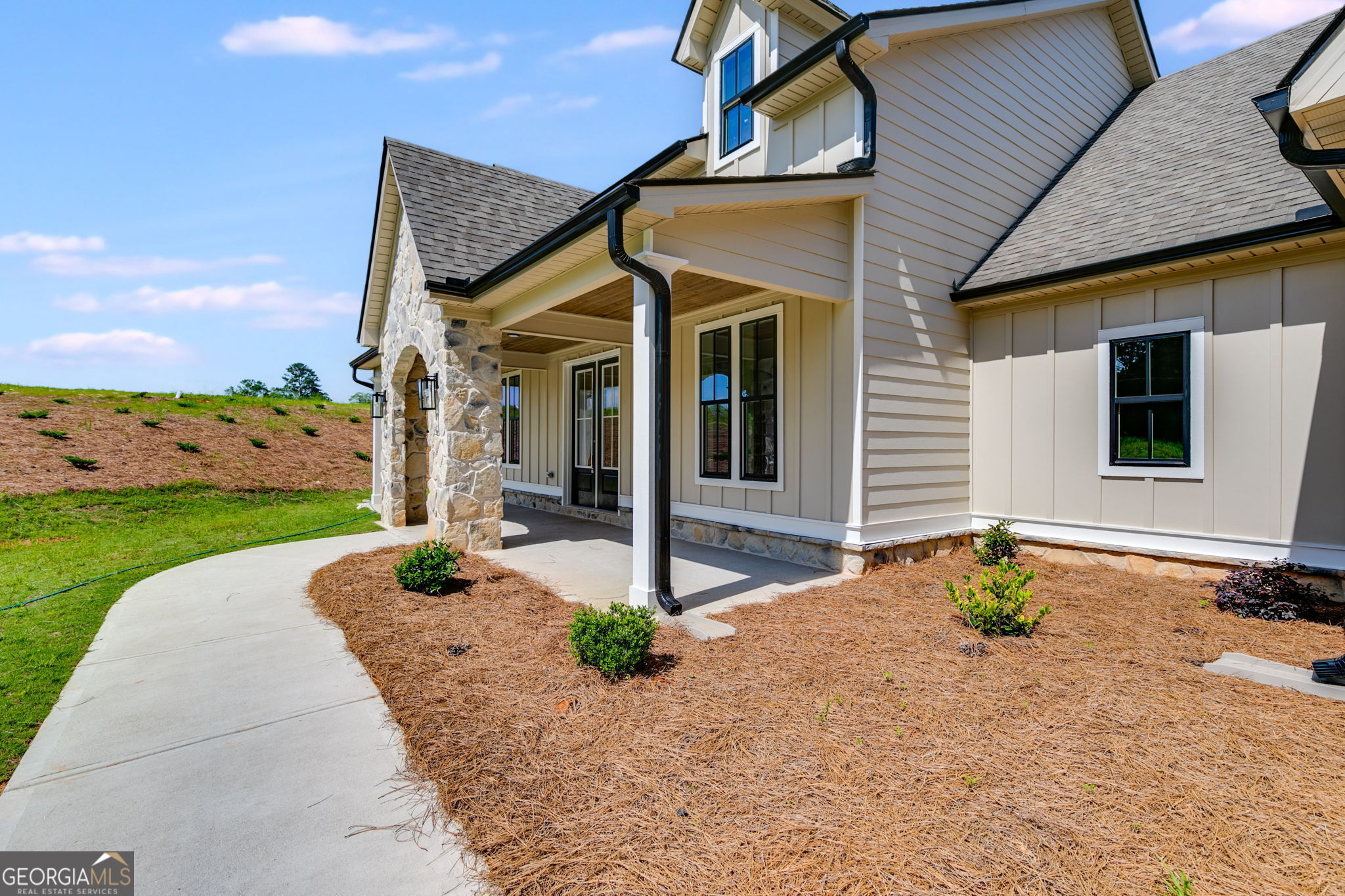 1575 Bethesda Church Road Carrollton, GA 30117 - Photo 5 of 46 a front view of a house with garden