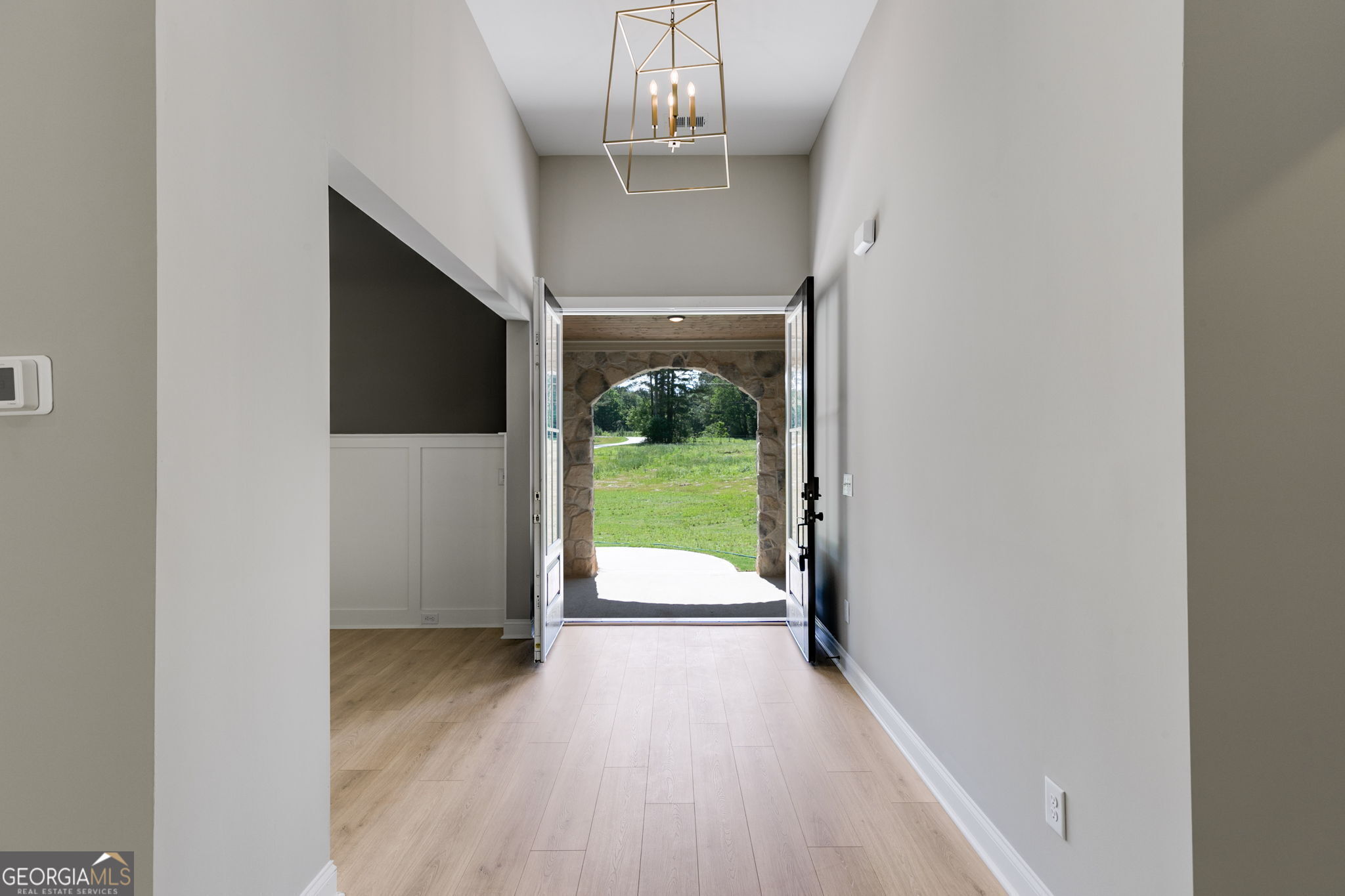 1575 Bethesda Church Road Carrollton, GA 30117 - Photo 8 of 46 a view of a porch with wooden floor a fireplace