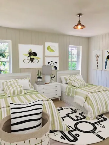 a living room with a bed and a window