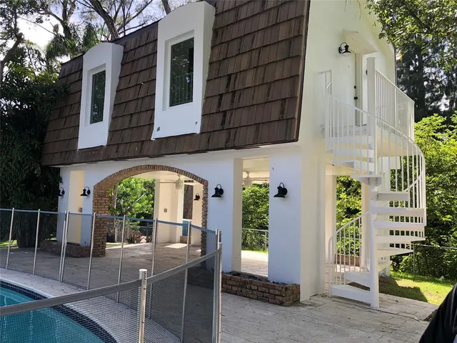 a view of a building with a porch