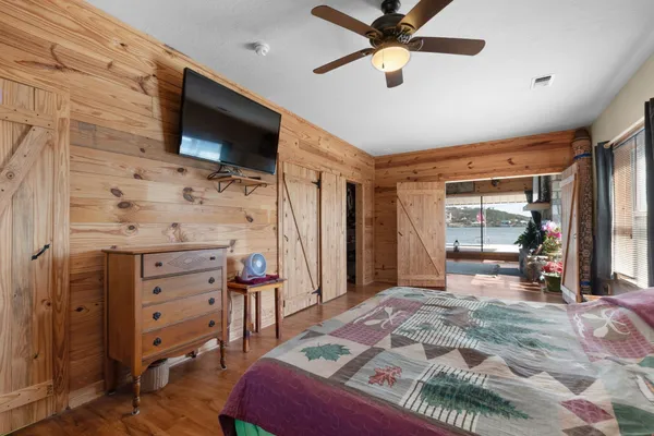 a bathroom with a glass shower door