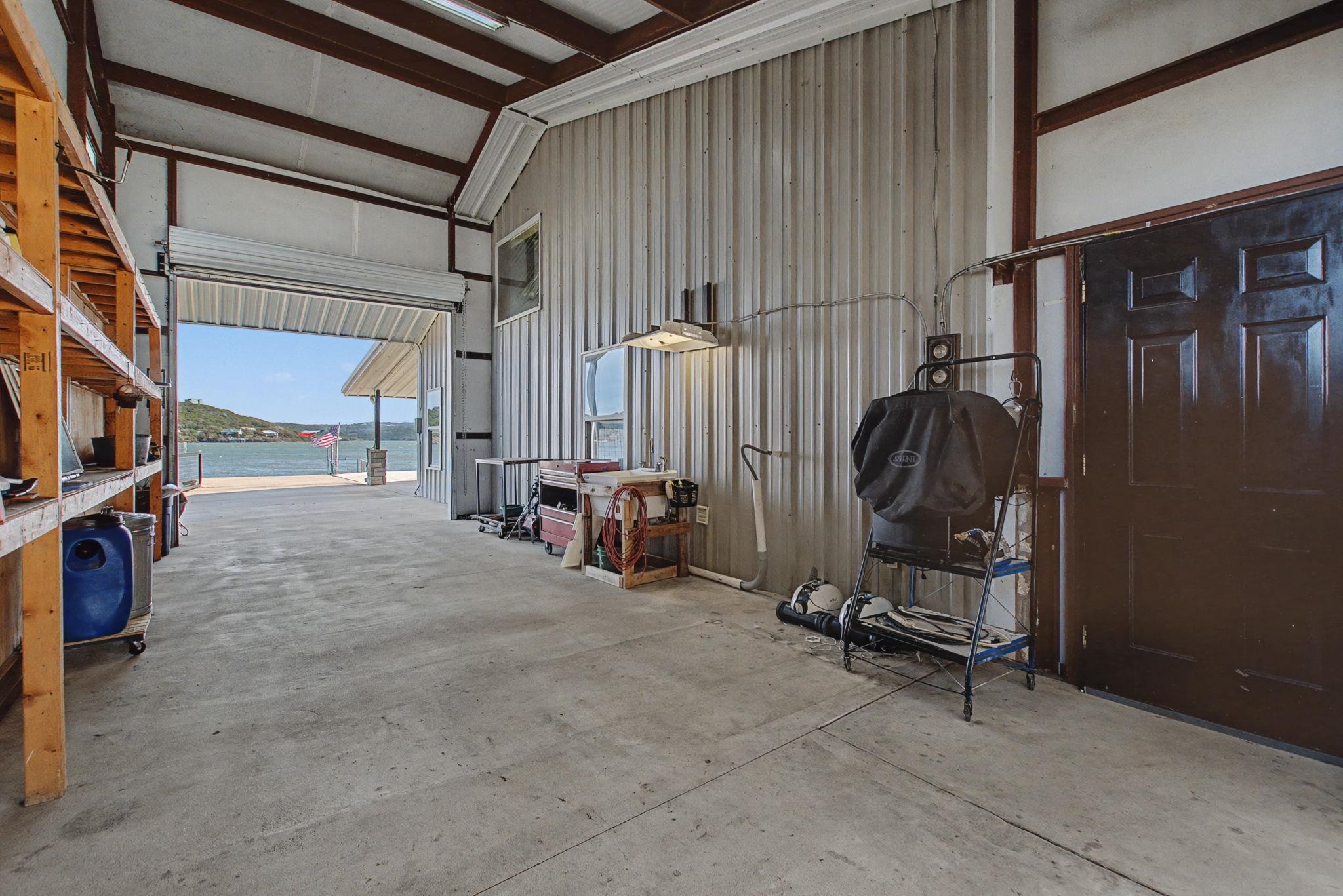 303 Lakeshore Loop Tow, TX 78672 - Photo 7 of 30 a view of a storage room with utility room