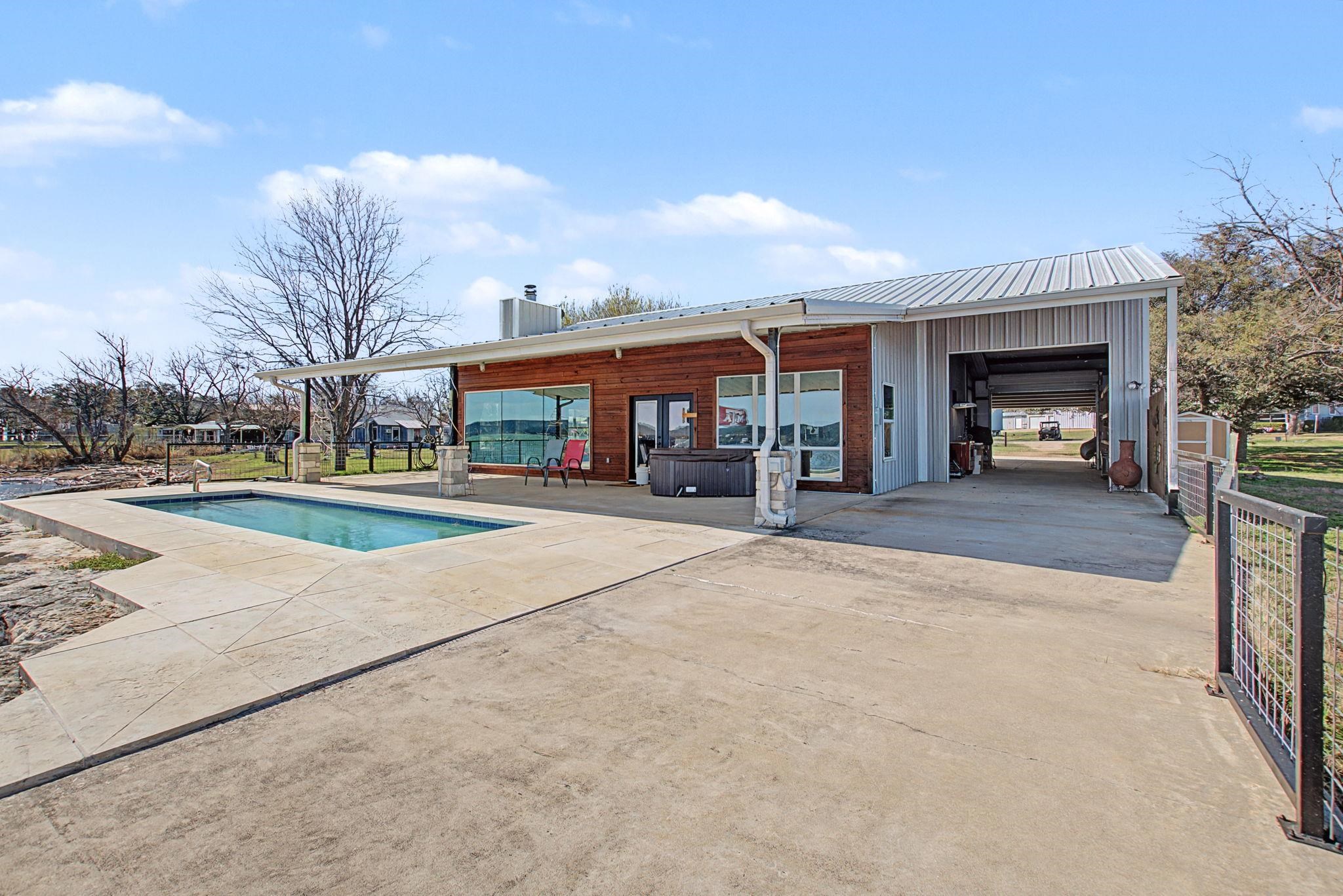 303 Lakeshore Loop Tow, TX 78672 - Photo 9 of 30 a view of a house with outdoor space and porch