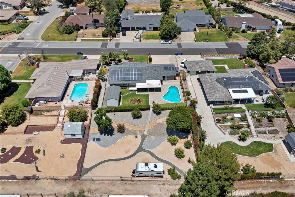 8527 Hillside Road Rancho Cucamonga, CA 91701 - Photo 42 of 50 an aerial view of a swimming pool