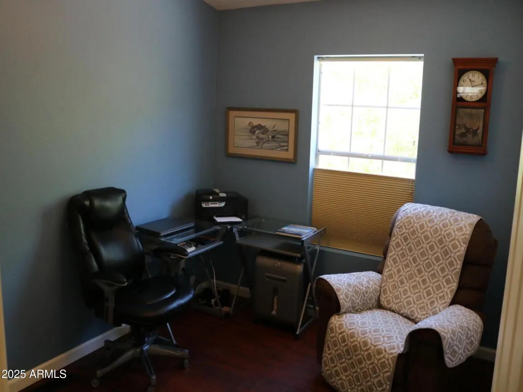 2322 Beasley Flat Road Camp Verde, AZ 86322 - Photo 12 of 27 a livingroom with workspace and a couch