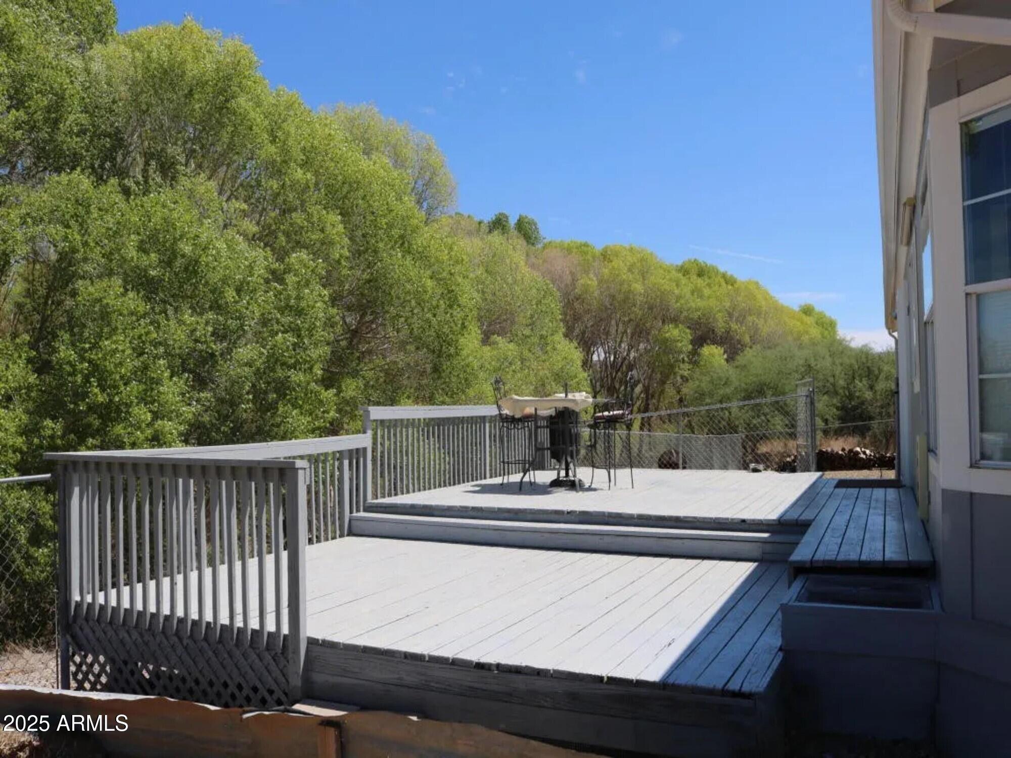 2322 Beasley Flat Road Camp Verde, AZ 86322 - Photo 22 of 27 a view of a roof deck with couches