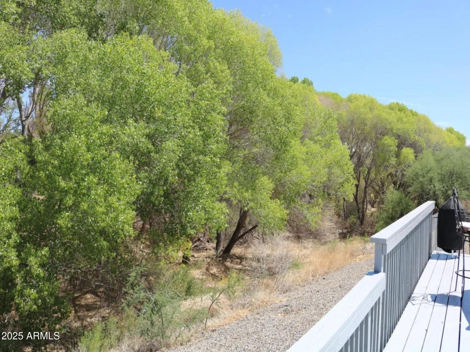2322 Beasley Flat Road Camp Verde, AZ 86322 - Photo 25 of 27 a view of a yard with a house