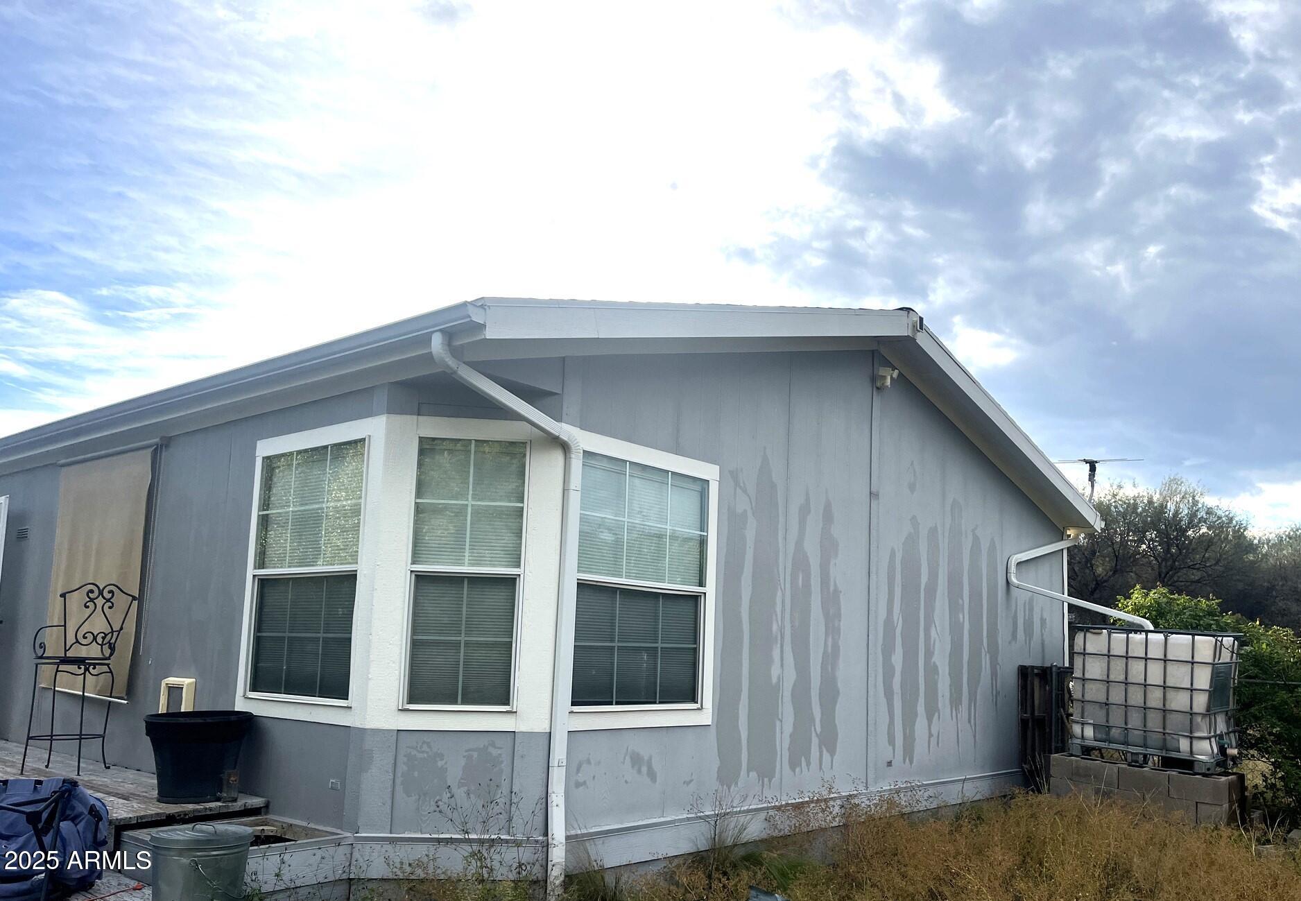 2322 Beasley Flat Road Camp Verde, AZ 86322 - Photo 27 of 27 a house with trees in the background