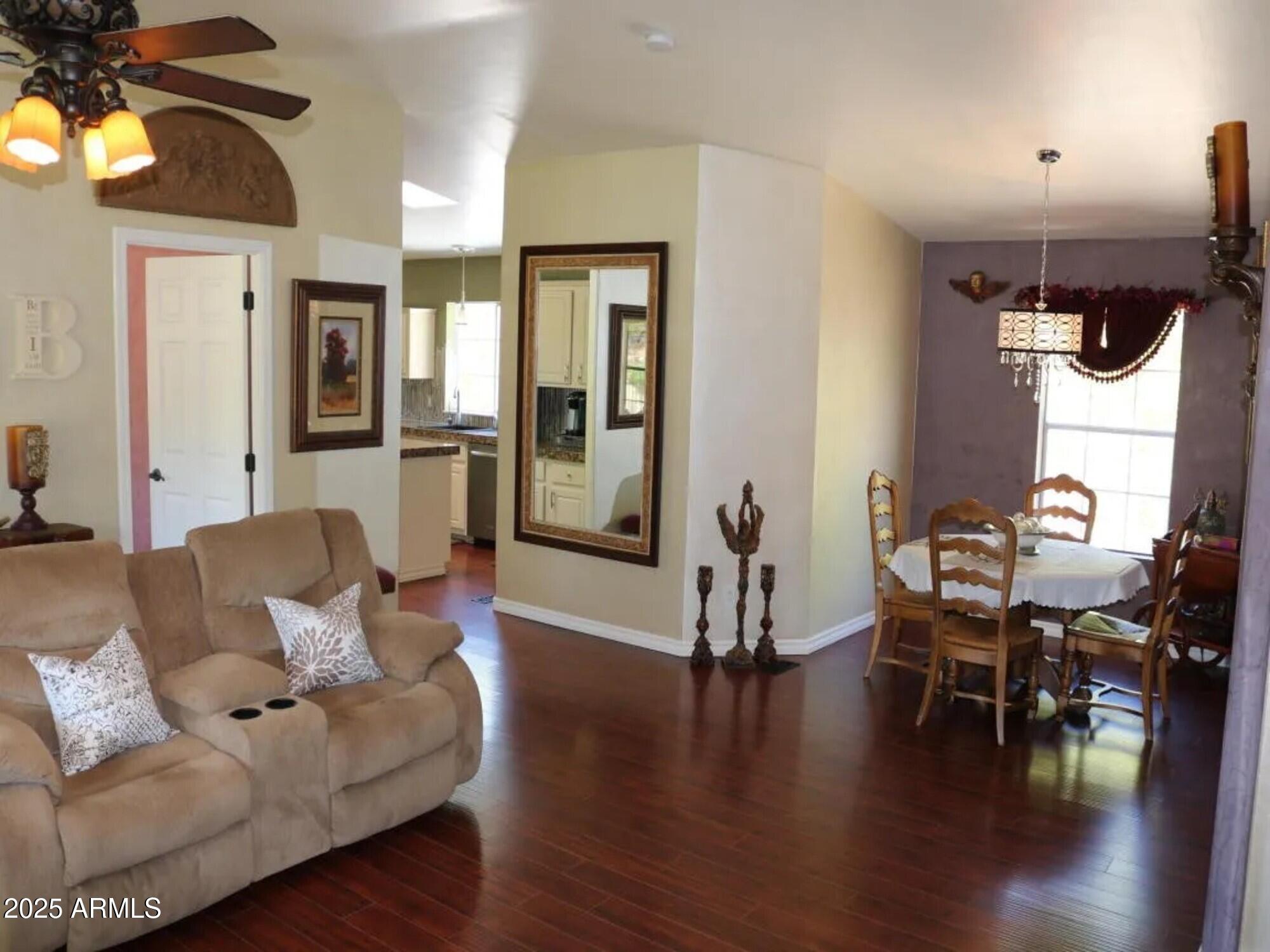 2322 Beasley Flat Road Camp Verde, AZ 86322 - Photo 6 of 27 a living room with furniture and a wooden floor