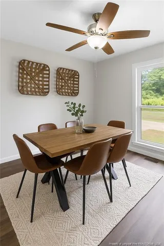 a view of a dining room with furniture