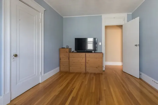 a view of a livingroom with wooden floor