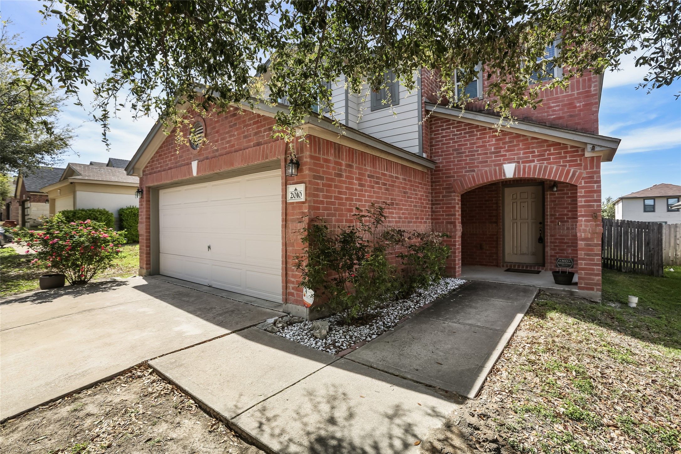 2010 Ashberry Trail Georgetown, TX 78626 - Photo 1 of 24 Traditional home with a garage, driveway, and brick siding