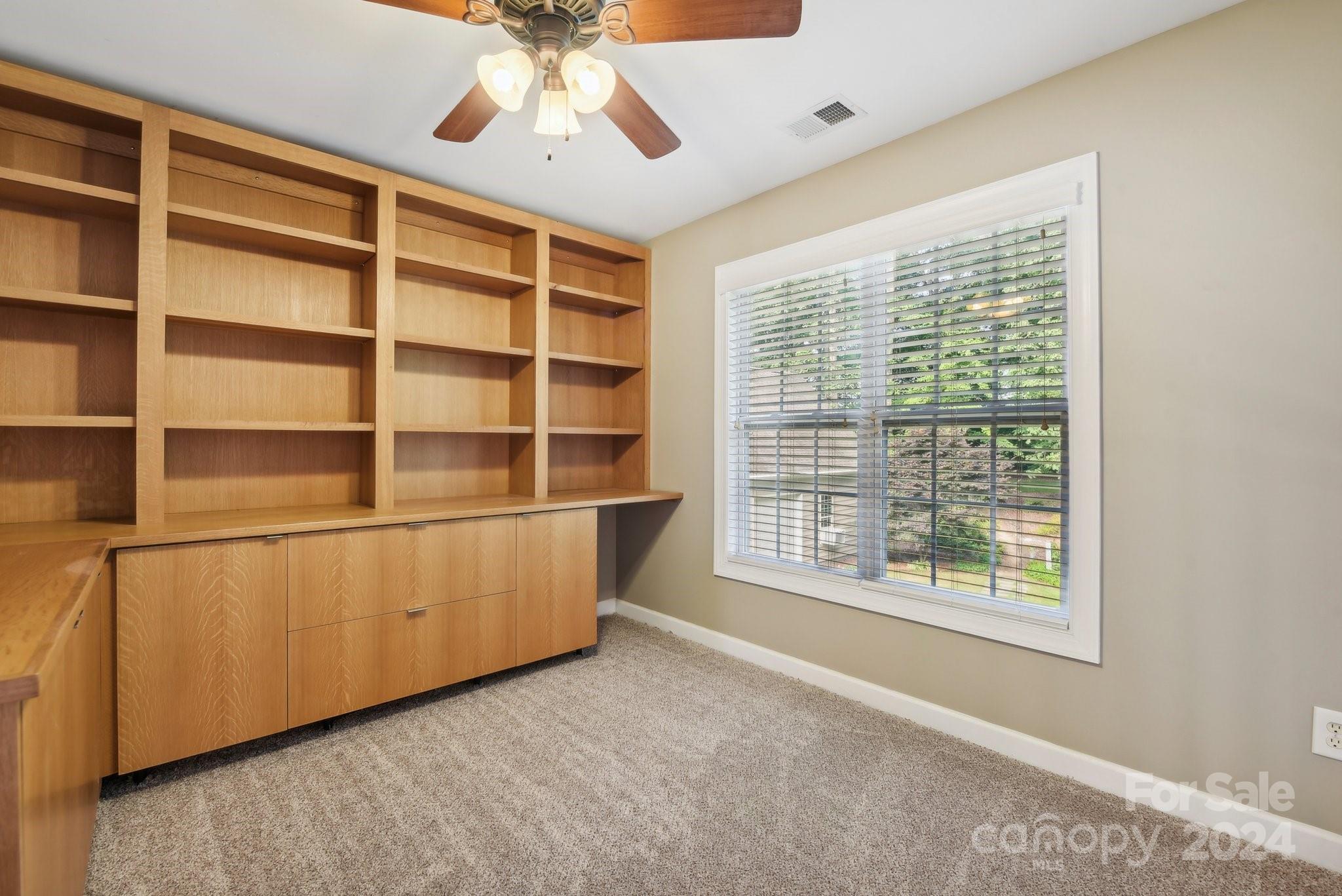 1013 Wesley Downs Road Monroe, NC 28110 - Photo 23 of 41 a view of an empty room with a window