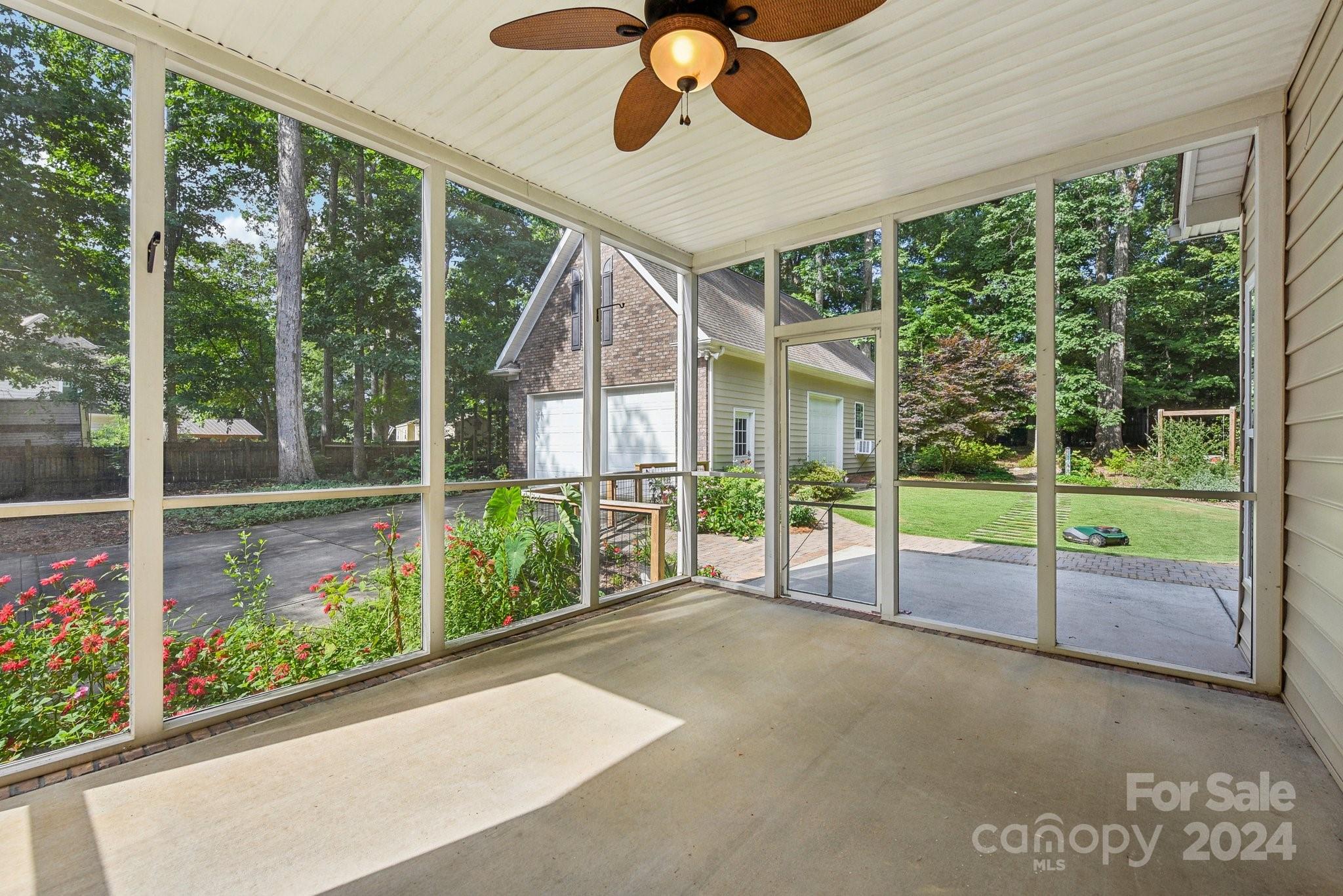 1013 Wesley Downs Road Monroe, NC 28110 - Photo 31 of 41 a view of a porch and garden