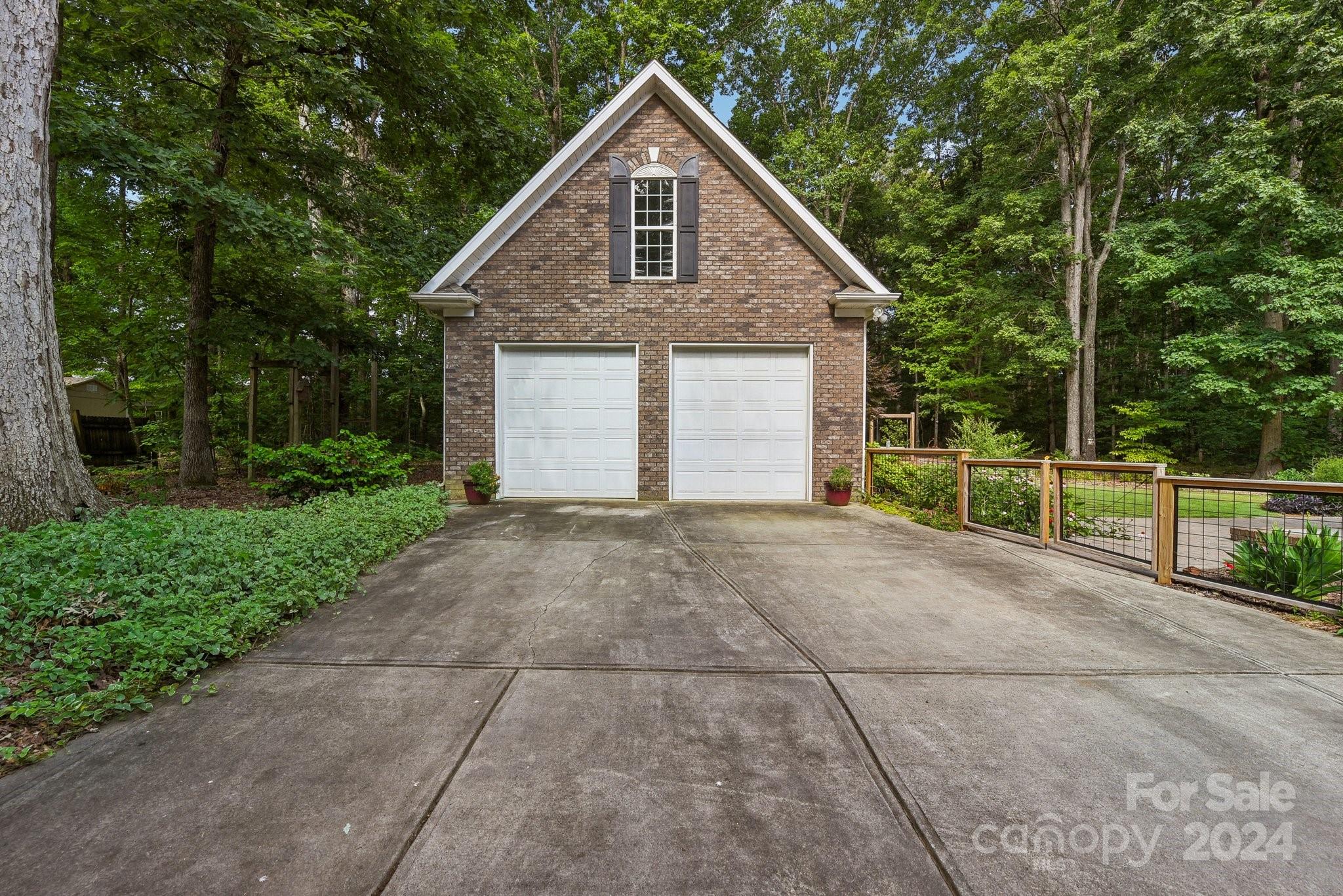 1013 Wesley Downs Road Monroe, NC 28110 - Photo 38 of 41 a view of a house with backyard