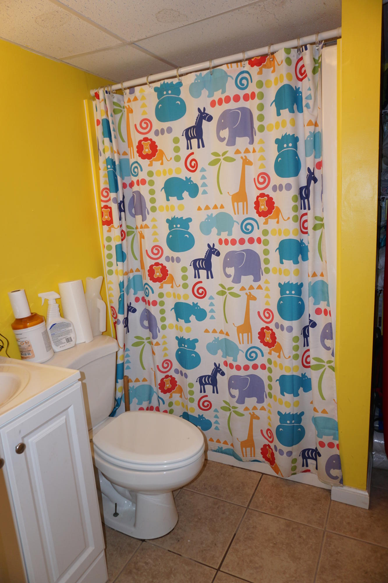 17 Arbeta Road Barnstable, MA 02601 - Photo 8 of 11 a white toilet sitting next to a shower curtain