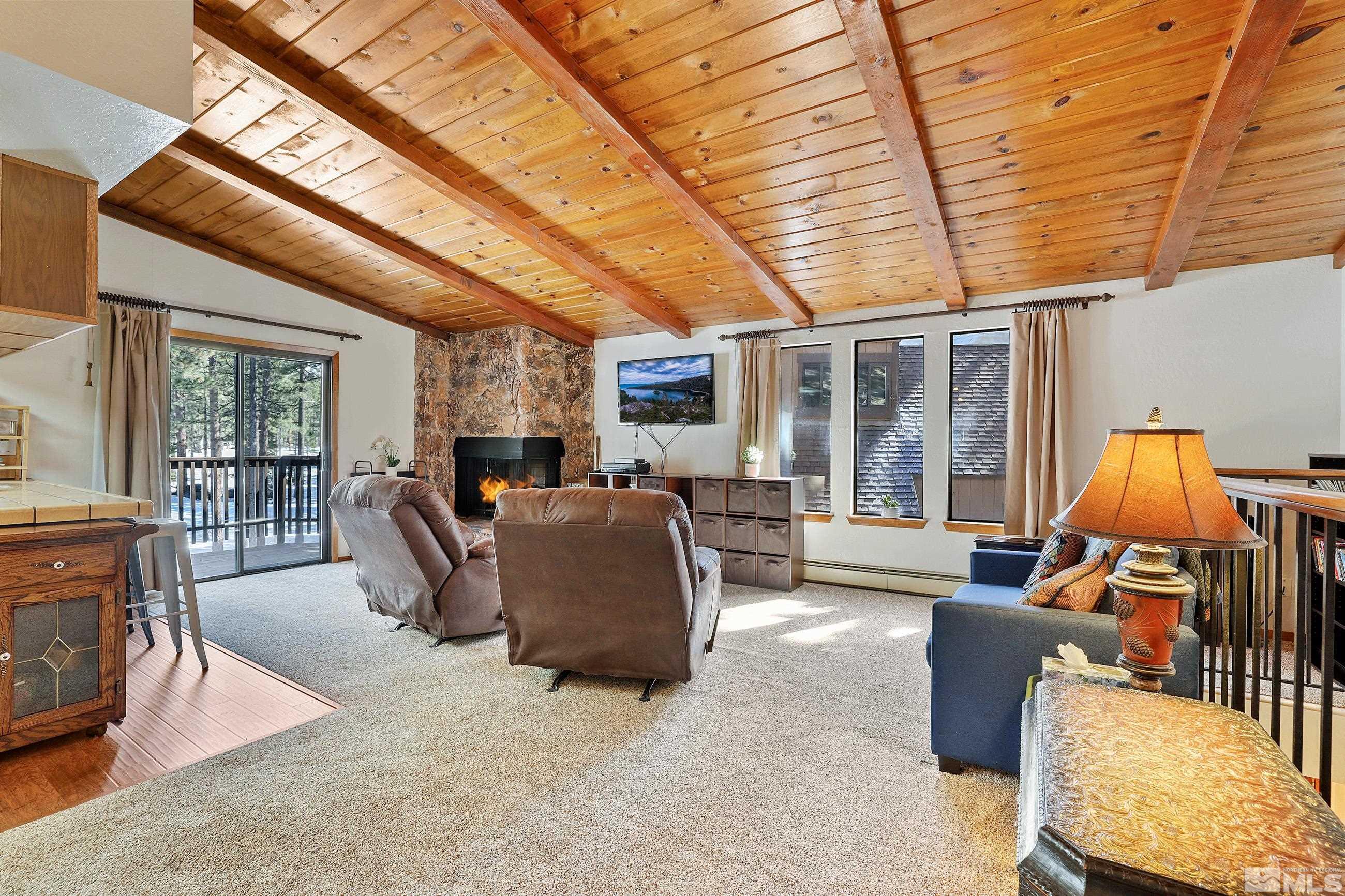 84 Rubicon Circle North, Unit C Stateline, NV 89449 - Photo 5 of 22 a living room with furniture and a flat screen tv